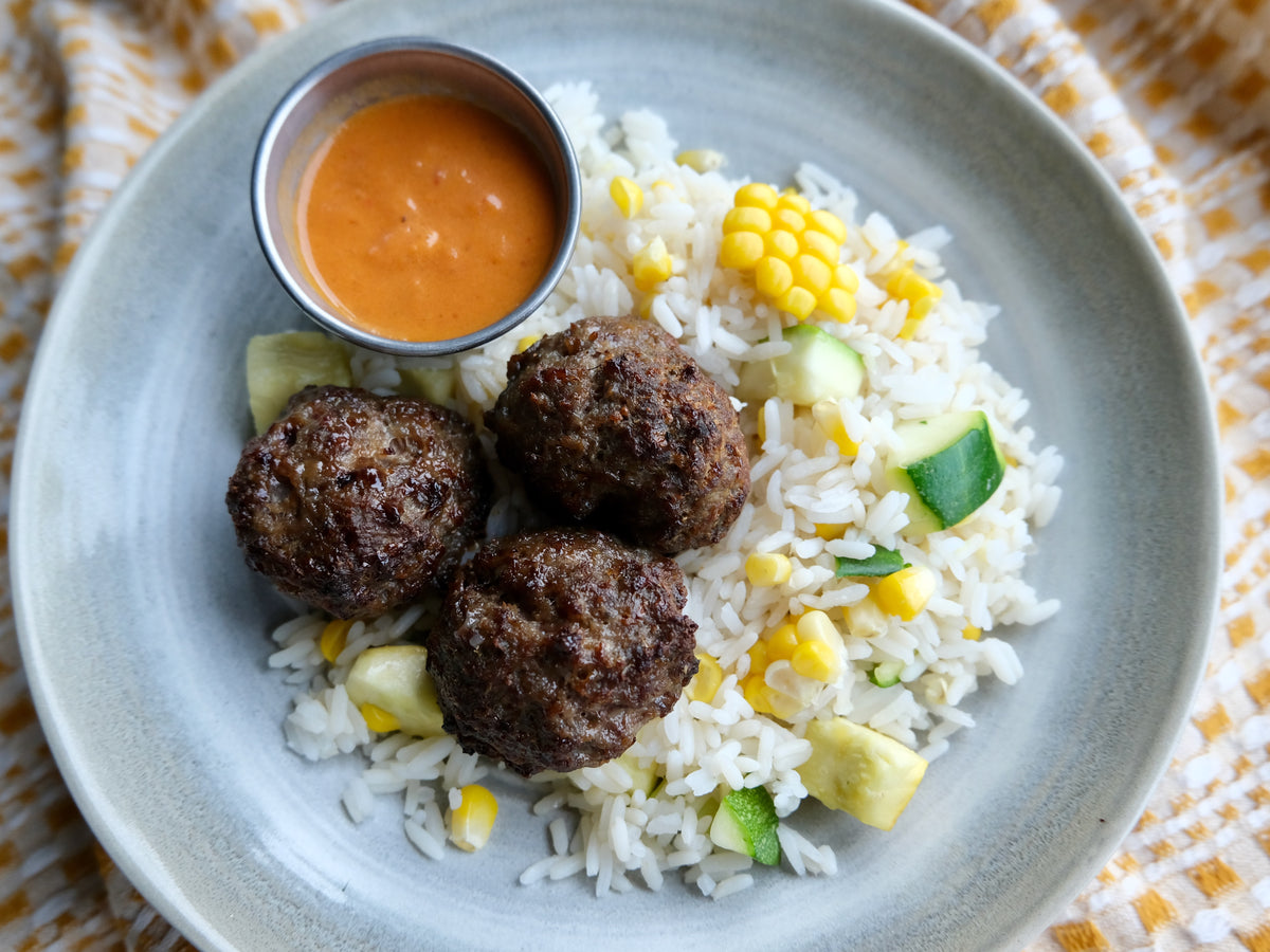 Beef Meatballs With Chipotle Tomato Sauce, Rice With Local Corn & Zucchini