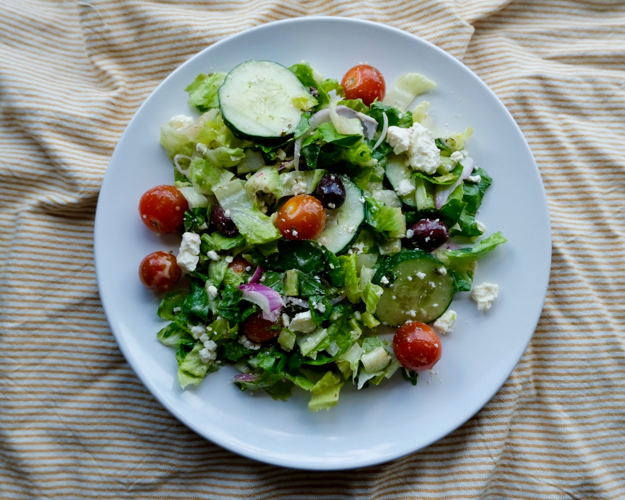 House Greek Salad: Cherry Tomatoes, Cucumbers, Kalamata Olives & Feta Cheese