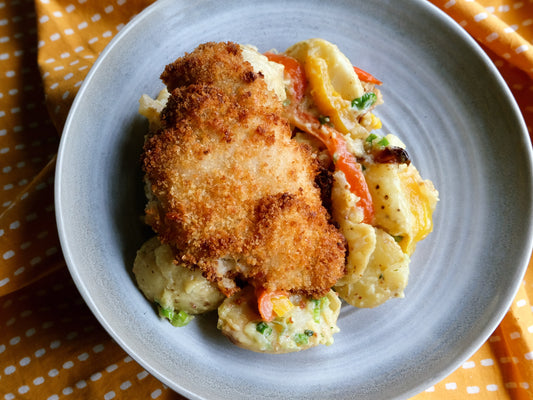 Crispy Chicken (Thigh), Potatoes with Peppers, Onions & Bacon Dressing
