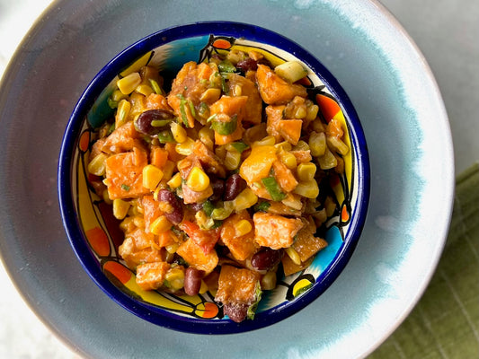 Roasted Sweet Potatoes with Organic Black Beans, Corn, Peppers & Chili Lime Dressing