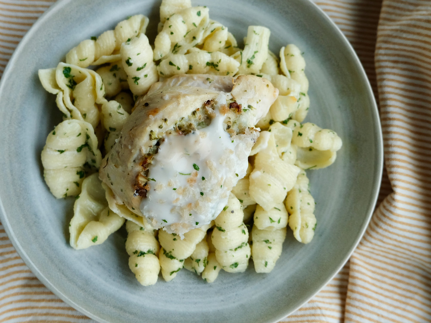Chicken (breast) Cordon Bleu Stuffed with Ham & Aged Ontario Cheddar, fettuccine pasta with butter & herbs