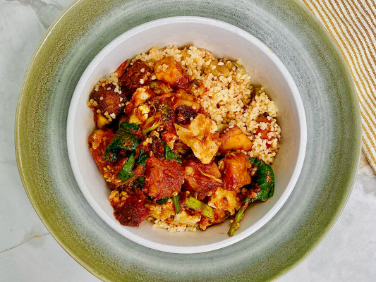 Vegetable Tagine with Harissa Sauce, Organic Couscous with Chickpeas, Sultanas & Green Onions